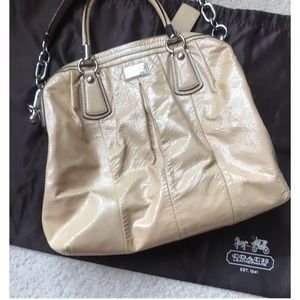 Free with purchase of Tory, Ted, Ugg or Vince